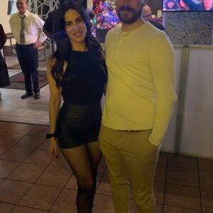 Black open back/cross back body suit